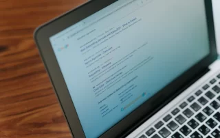 Google search results shown on laptop