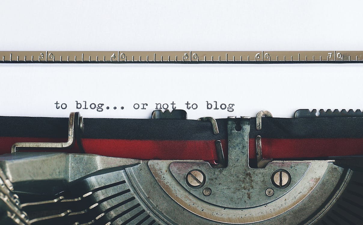 close-up view of vintage typewriter writing to blog… or not to blog