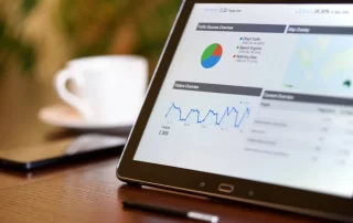 tablet computer on table displaying Google analytics