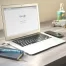 laptop on desk displaying Google search