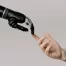 traditional SEO and AI concept image - robotic hand and human hand touching fingertips