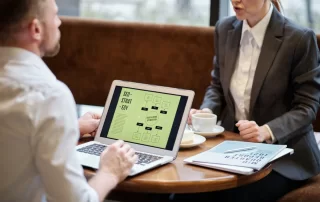 two colleagues having SEO meeting