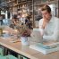 business man working in cafe, looking at laptop