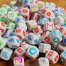 pile of dice, each decorated with a different social media platform logo