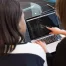 two web developers looking at code on laptop